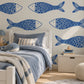 Papier peint panoramique Nage Indigo dans une chambre d’enfant lumineuse